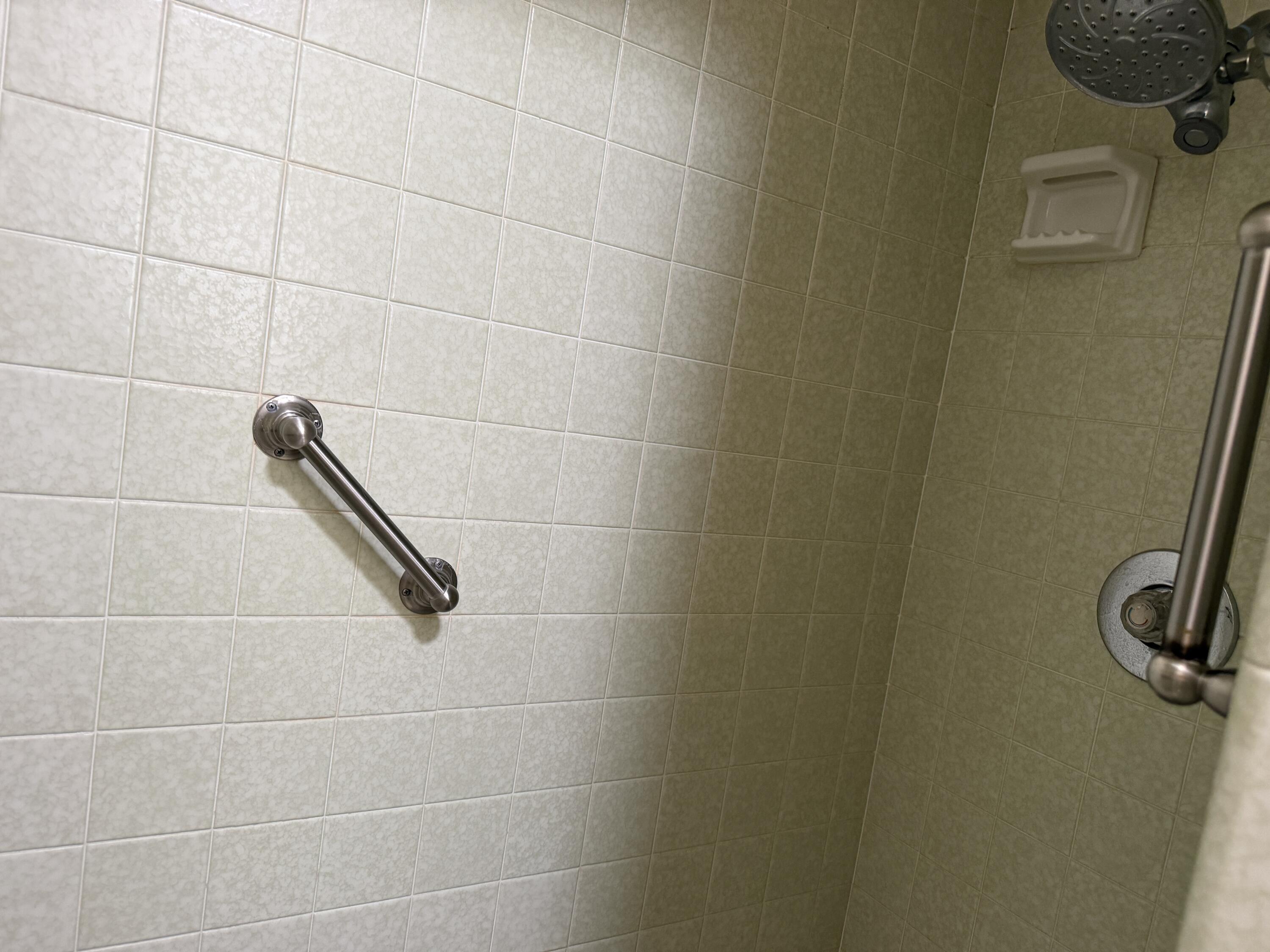 1603 South 8th Street Lamesa, TX 79331 - Photo 20 of 39 a bathroom with a shower