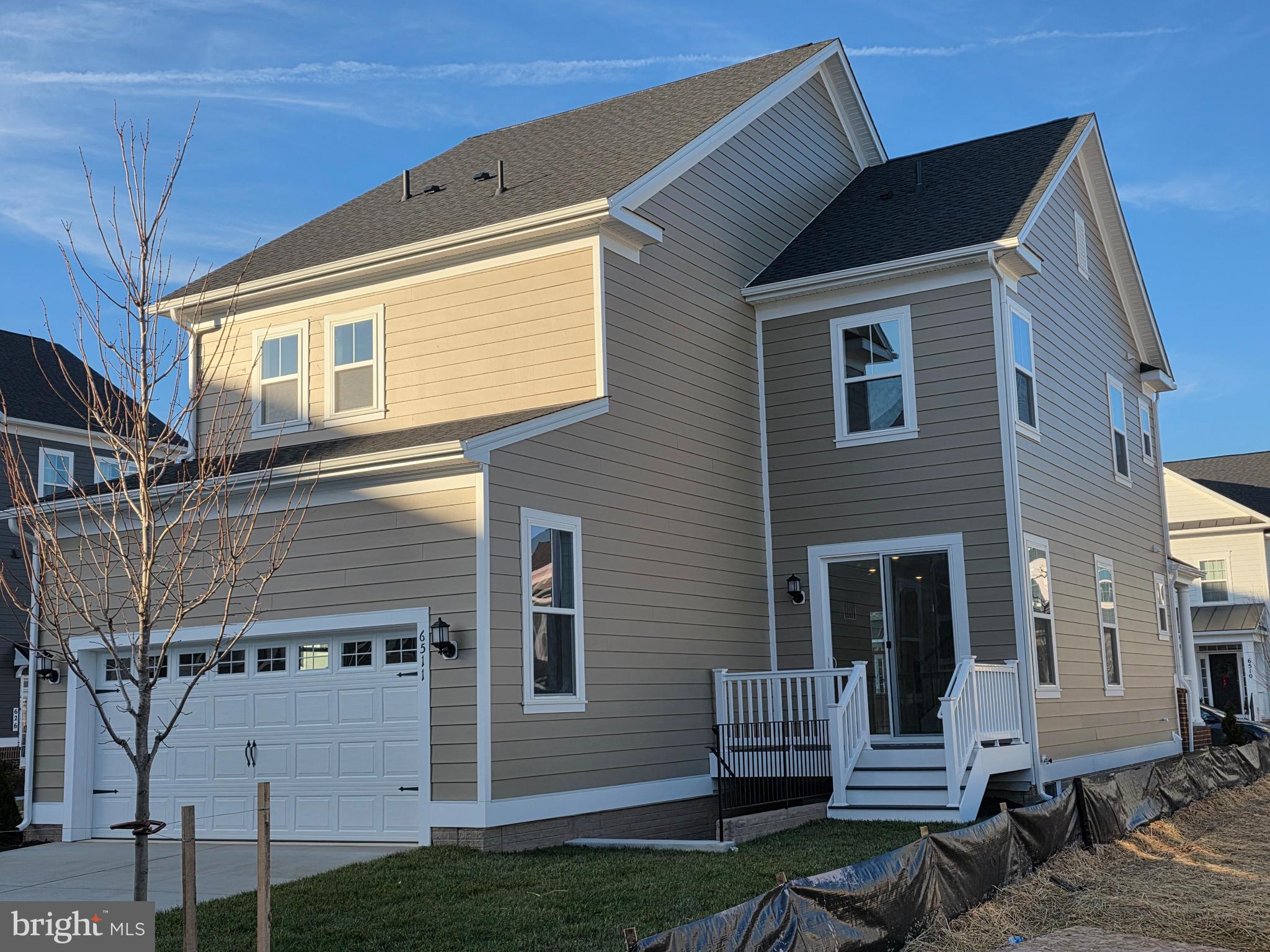 6511 Paddington Street Middle River, MD 21220 - Photo 5 of 46 a front view of a house with garden