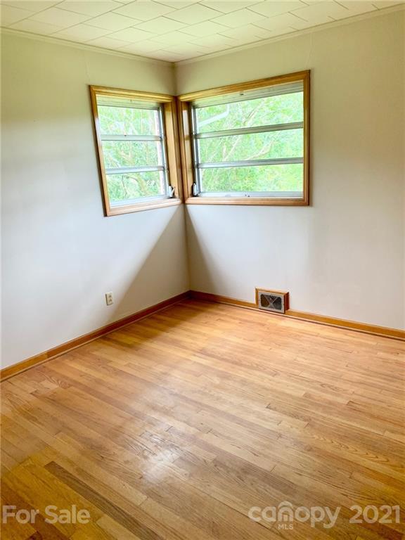 379 South Goforth Road Ferguson, NC 28624 - Photo 12 of 16 a view of an empty room with a window