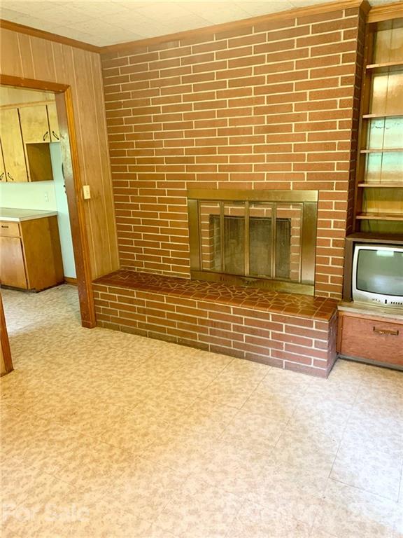 379 South Goforth Road Ferguson, NC 28624 - Photo 6 of 16 a view of front door of house with car