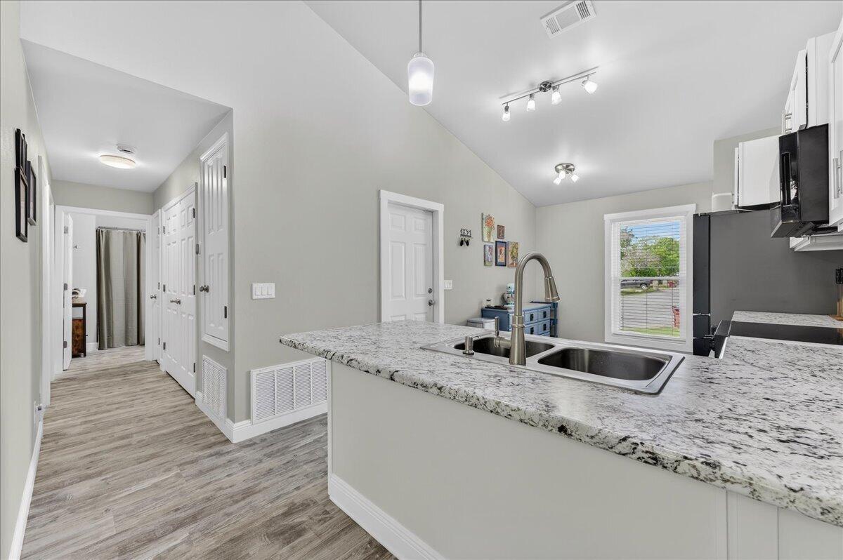 5328 Whitney Court Crestview, FL 32536 - Photo 15 of 48 a bathroom with a granite countertop sink and a mirror