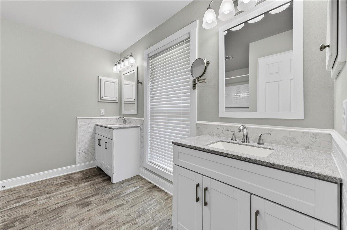 5328 Whitney Court Crestview, FL 32536 - Photo 29 of 48 a bathroom with a sink and a mirror