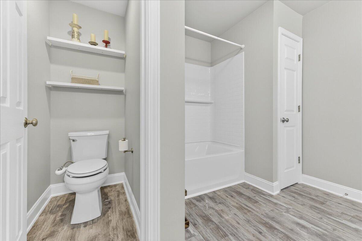 5328 Whitney Court Crestview, FL 32536 - Photo 31 of 48 a bathroom with a toilet and a shower