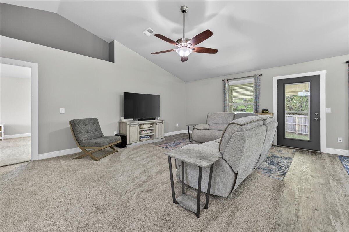 5328 Whitney Court Crestview, FL 32536 - Photo 6 of 48 a living room with furniture and a flat screen tv