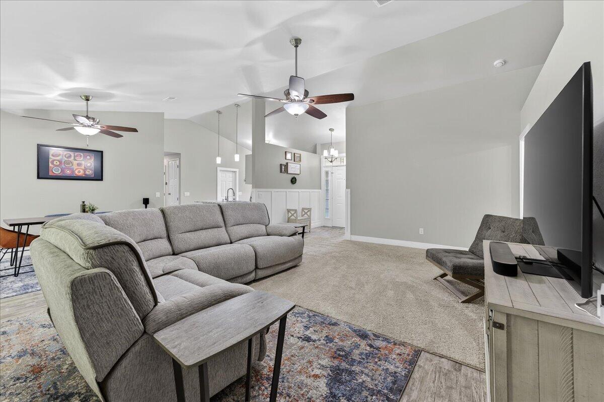 5328 Whitney Court Crestview, FL 32536 - Photo 8 of 48 a living room with furniture a ceiling fan and a rug