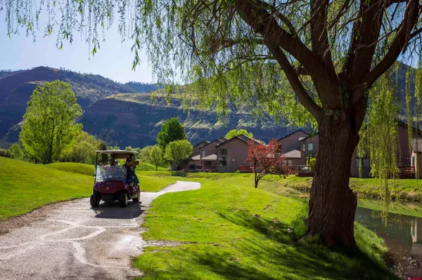 a view of a city with mountains in the background