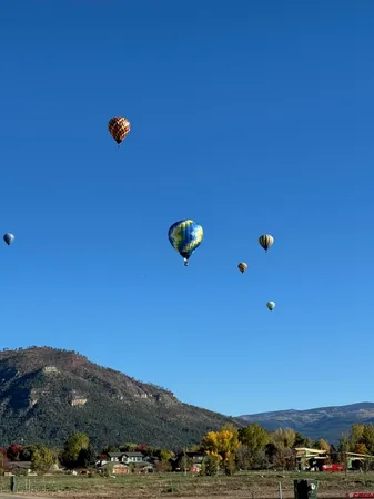 a view of swimming pool and an outdoor seating