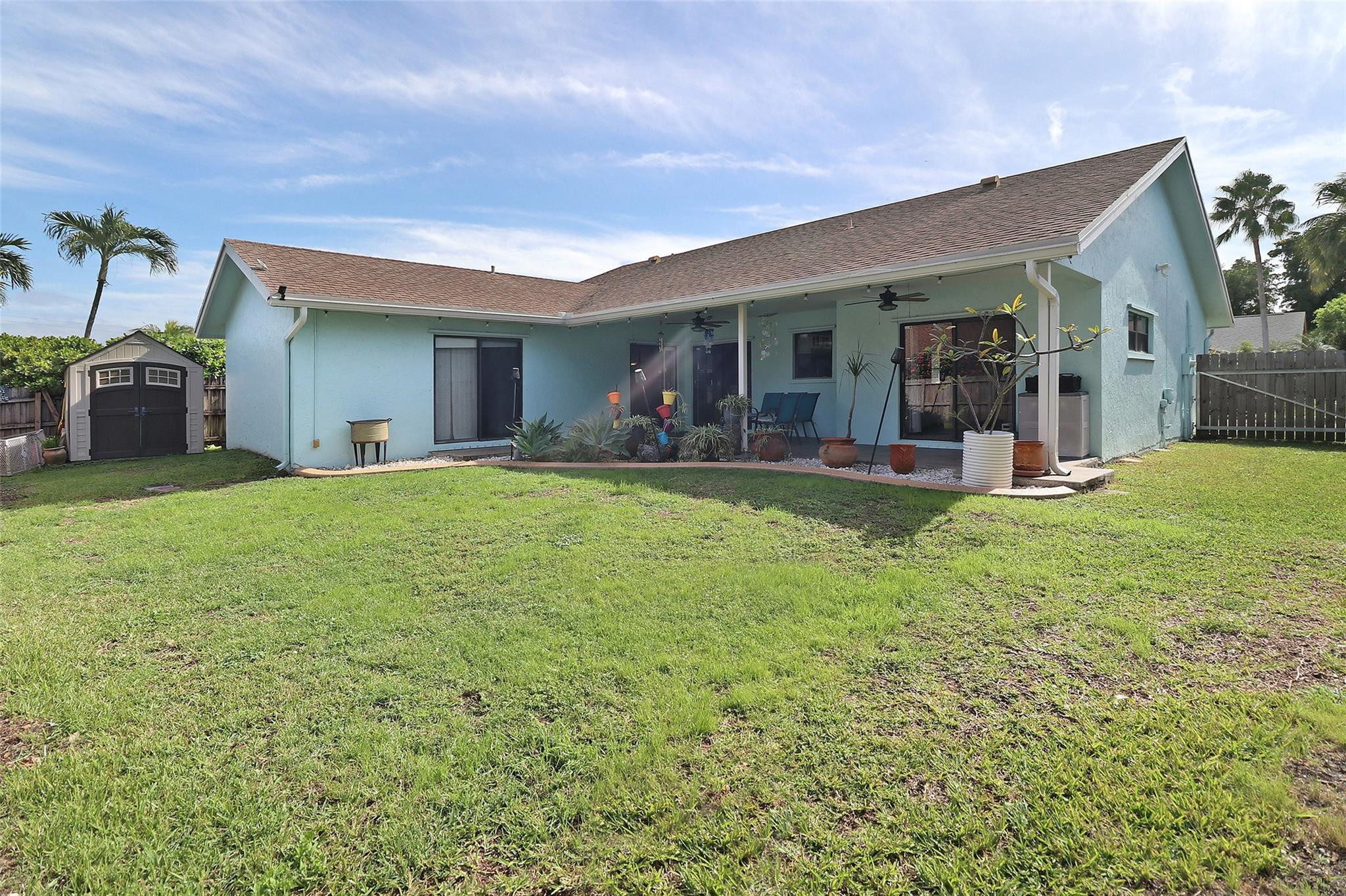 231 Southeast 9th Street Dania Beach, FL 33004 - Photo 9 of 27 a view of a house with backyard porch and sitting area