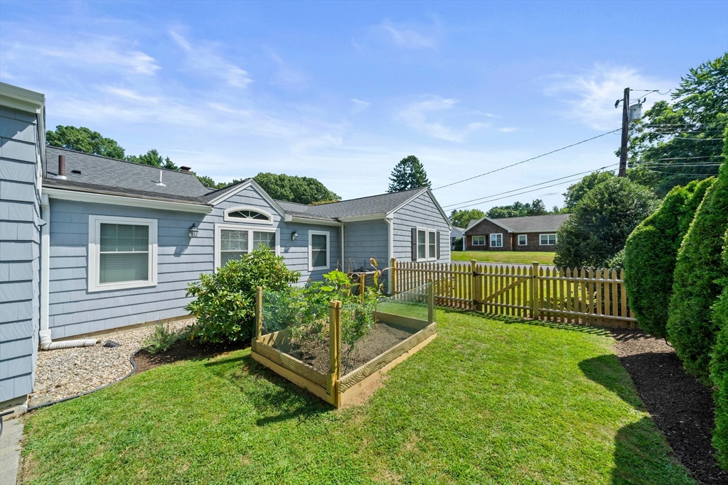 54 Birchcroft Road Canton, MA 02021 - Photo 15 of 37 a front view of a house with garden