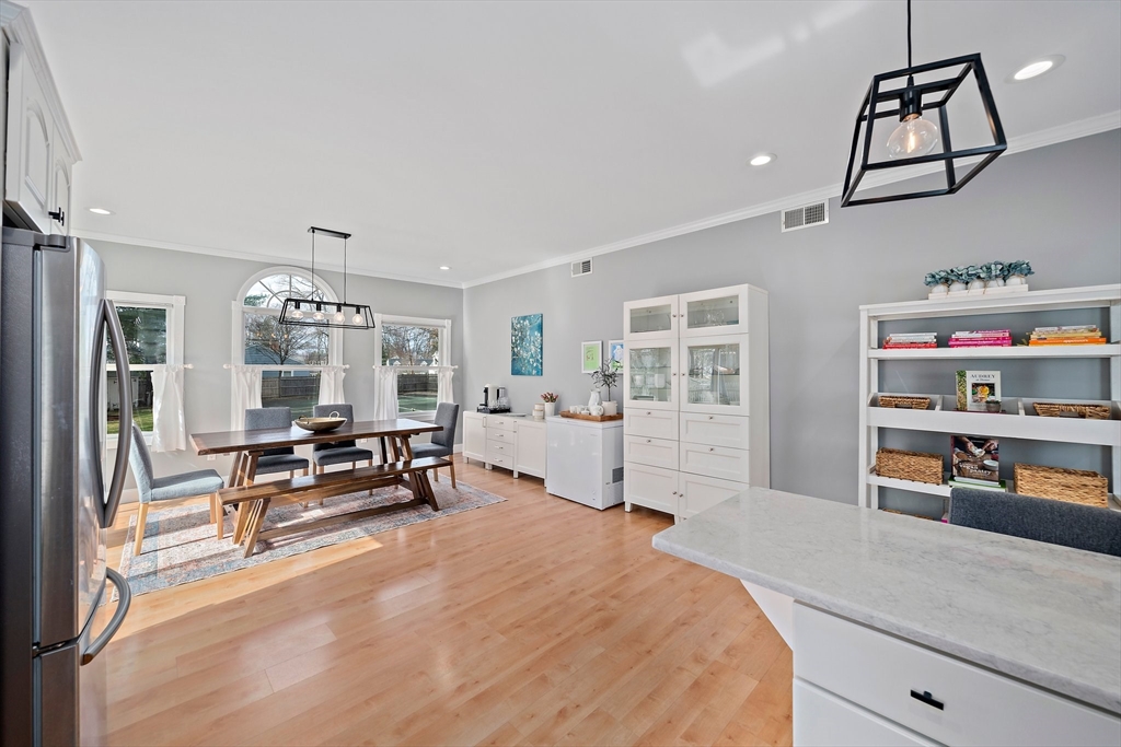 54 Birchcroft Road Canton, MA 02021 - Photo 18 of 37 a bedroom with furniture and a wooden floor