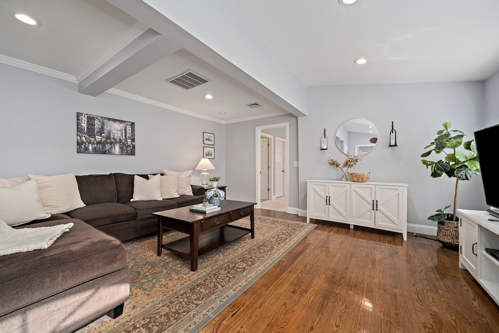54 Birchcroft Road Canton, MA 02021 - Photo 22 of 37 a living room with furniture and a wooden floor