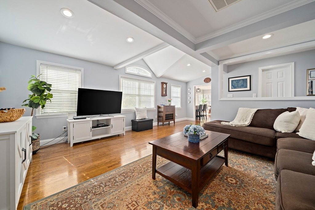 54 Birchcroft Road Canton, MA 02021 - Photo 23 of 37 a living room with furniture and a flat screen tv