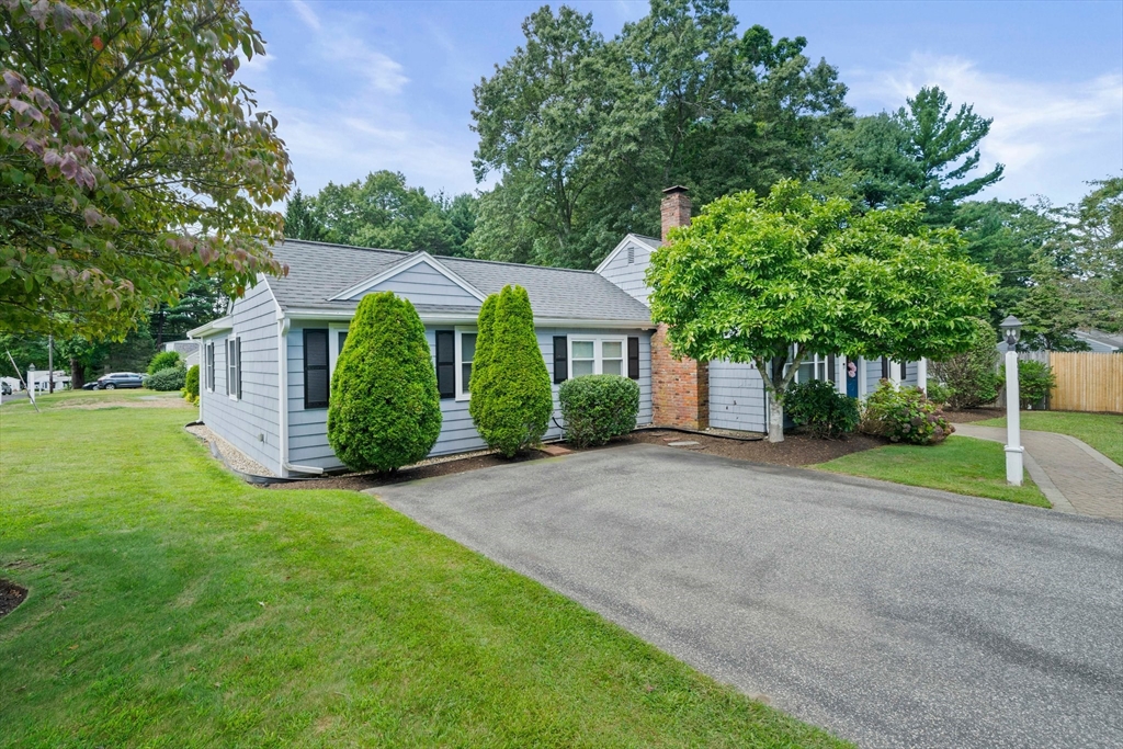 54 Birchcroft Road Canton, MA 02021 - Photo 3 of 37 a front view of a house with yard and green space