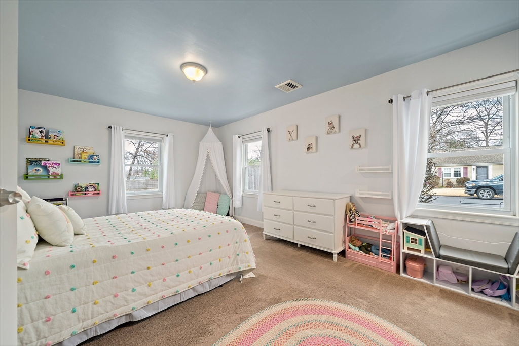 54 Birchcroft Road Canton, MA 02021 - Photo 35 of 37 a bedroom with a bed and a window