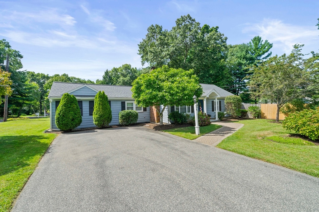 54 Birchcroft Road Canton, MA 02021 - Photo 5 of 37 a front view of a house with a yard