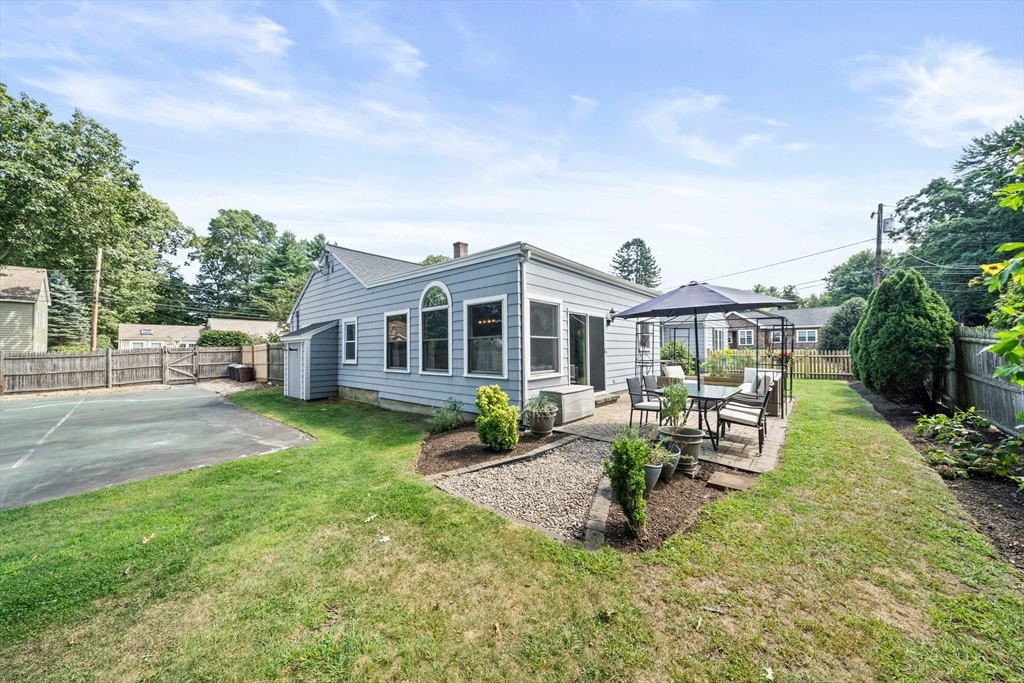 54 Birchcroft Road Canton, MA 02021 - Photo 8 of 37 a view of a house with backyard sitting area and garden
