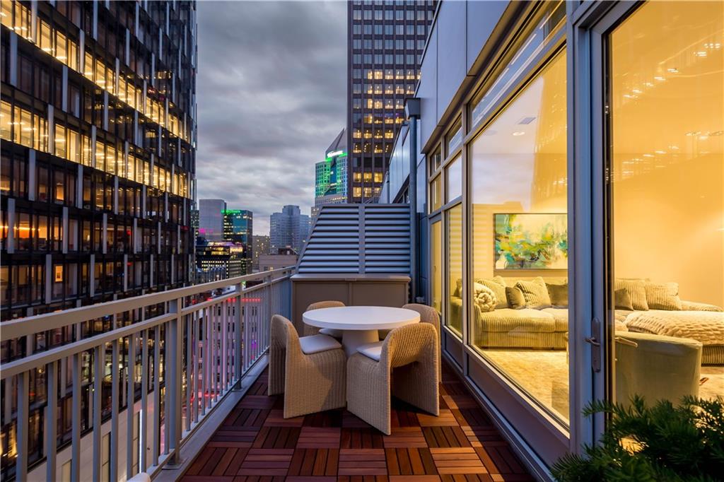 301 Fifth Avenue, Unit 720 Pittsburgh, PA 15222 - Photo 2 of 49 a view of a chairs and table in the balcony