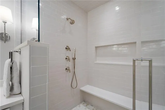 a bedroom with a bed and furniture