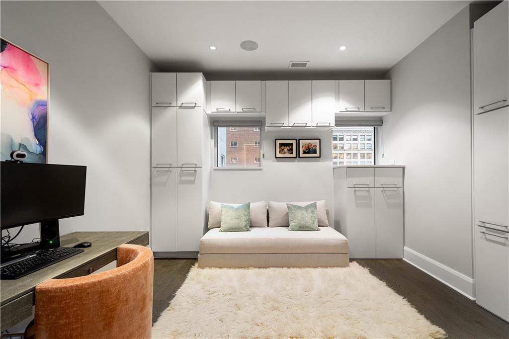 301 Fifth Avenue, Unit 720 Pittsburgh, PA 15222 - Photo 23 of 49 a bedroom with a bed and furniture