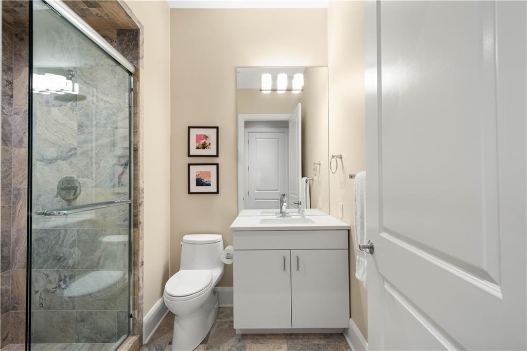 301 Fifth Avenue, Unit 720 Pittsburgh, PA 15222 - Photo 26 of 49 a bathroom with a sink toilet and shower