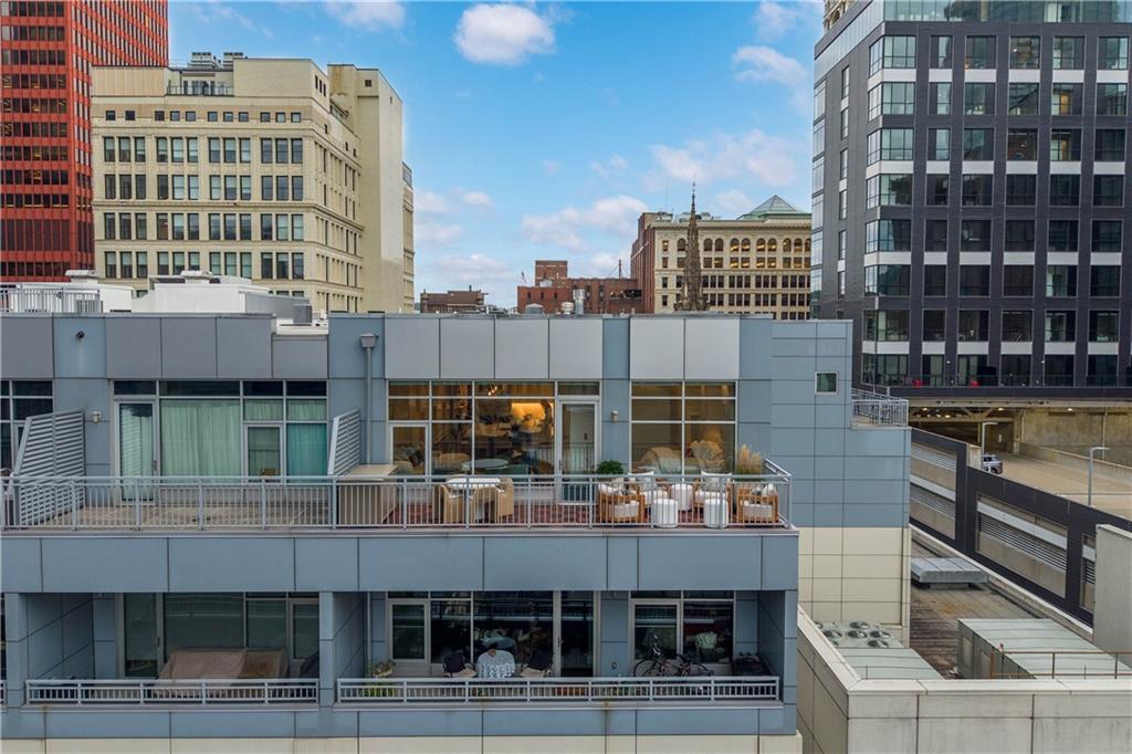 301 Fifth Avenue, Unit 720 Pittsburgh, PA 15222 - Photo 30 of 49 a tall building with a lot of windows