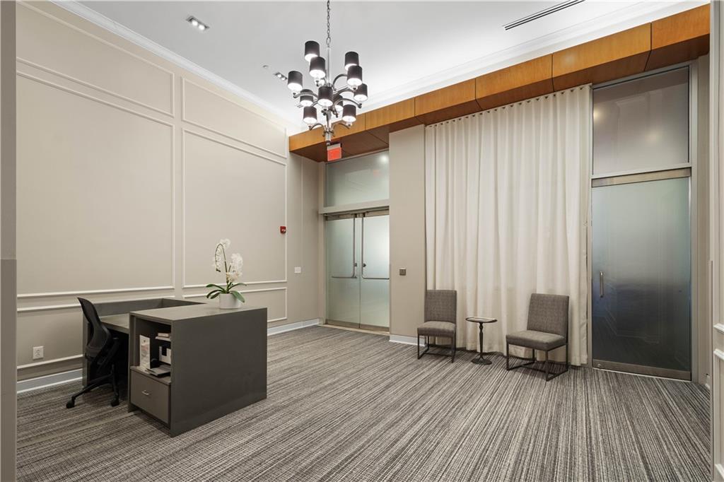 301 Fifth Avenue, Unit 720 Pittsburgh, PA 15222 - Photo 43 of 49 a view of a room with wooden floor and staircase
