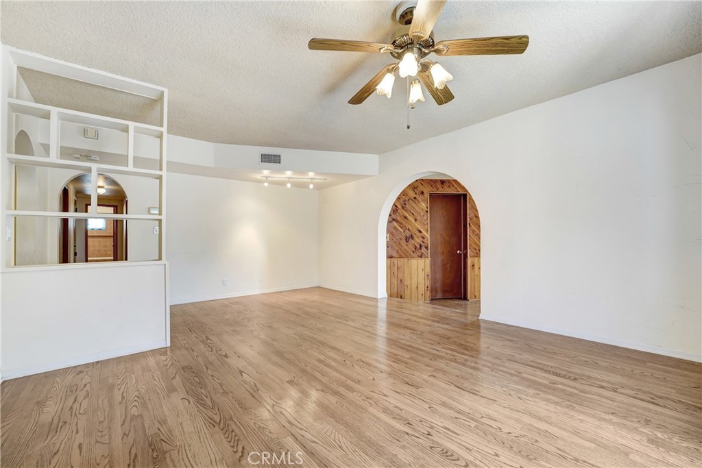 1636 Bentley Place Glendora, CA 91740 - Photo 8 of 25 wooden floor in an empty room with a window