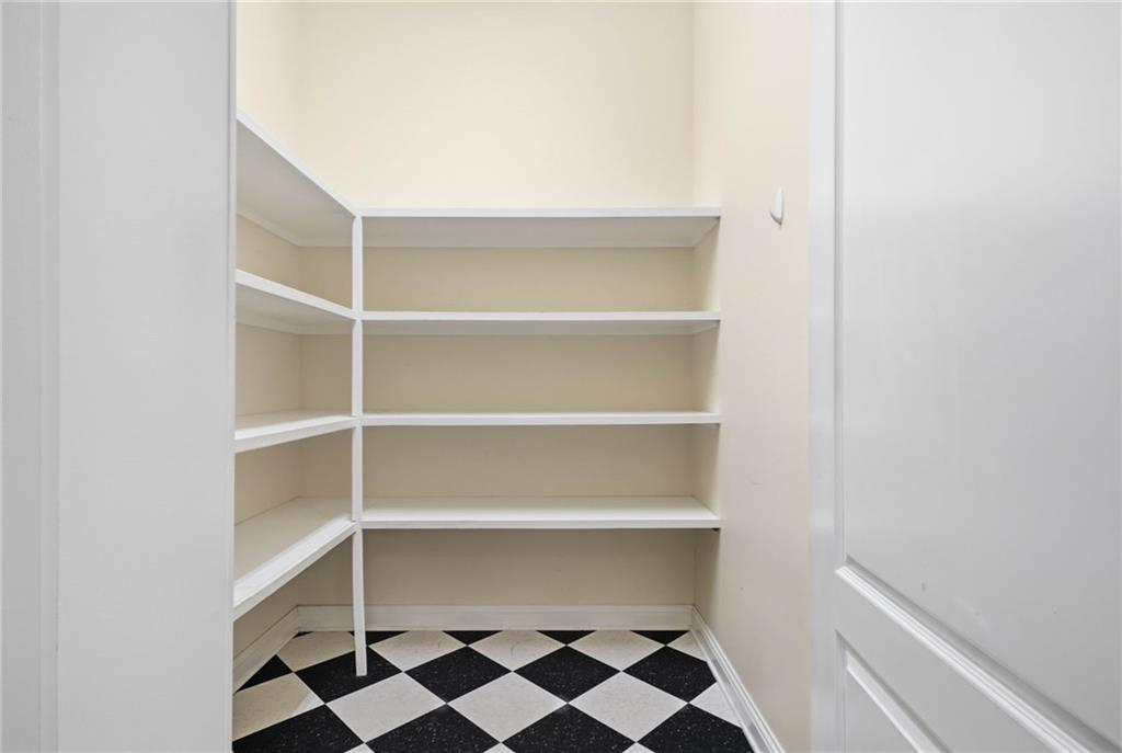 5 St Andrews Way Rome, GA 30165 - Photo 28 of 75 a view of walk in closet with empty racks