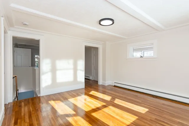 a view of an empty room and window