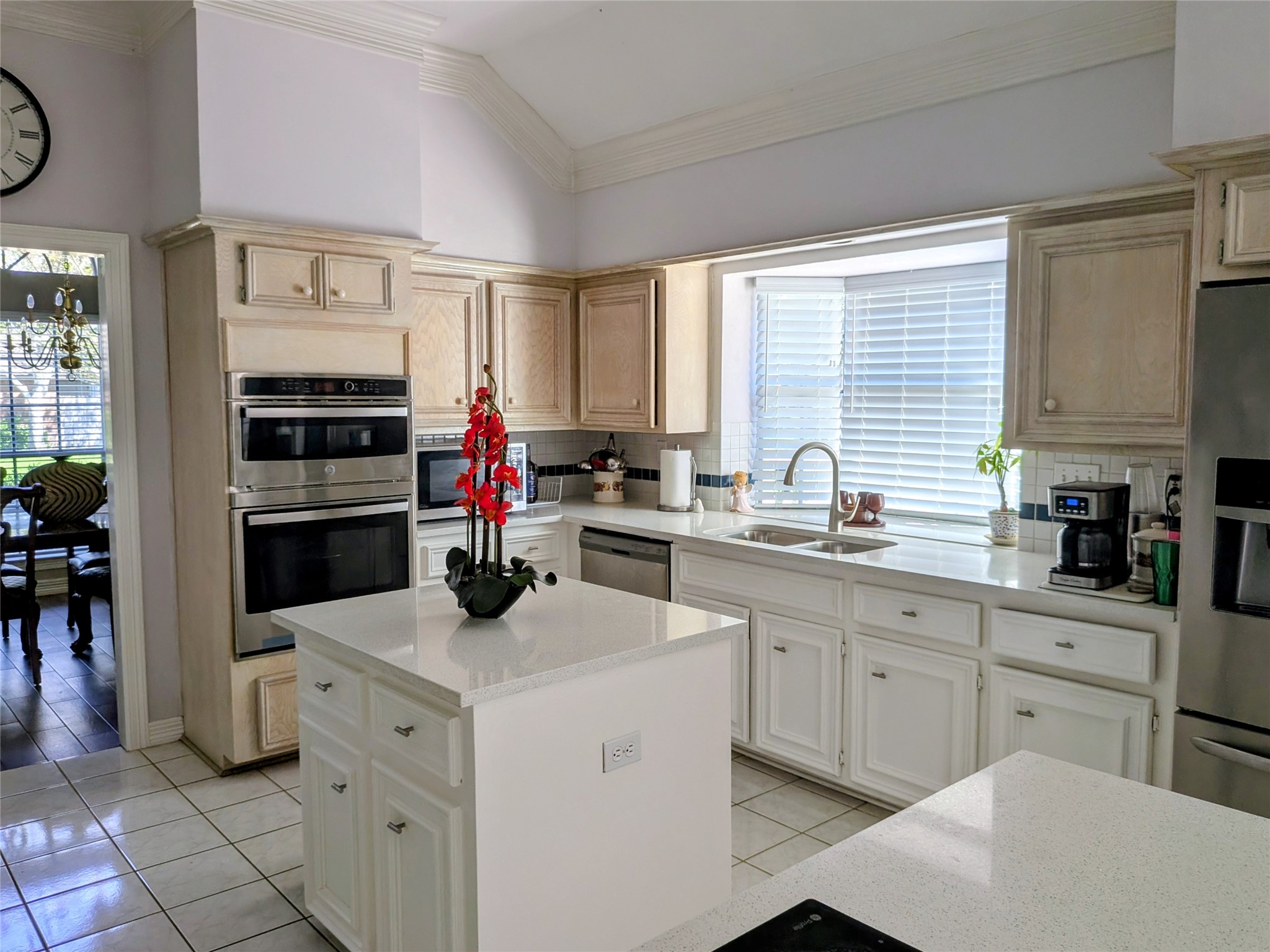 13107 Walnut Lake Road Houston, TX 77065 - Photo 11 of 23 a kitchen with a stove cabinets and a refrigerator