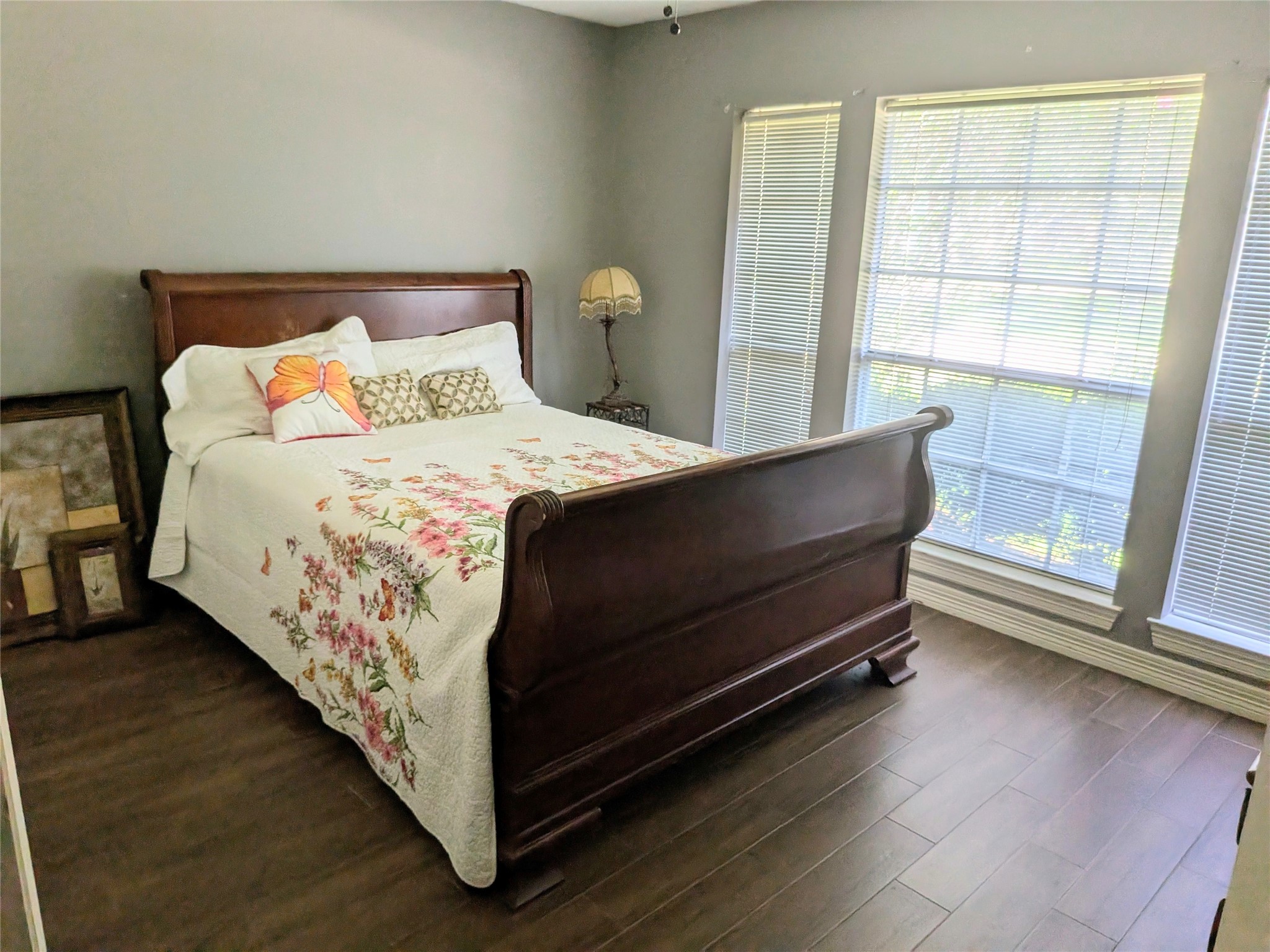 13107 Walnut Lake Road Houston, TX 77065 - Photo 15 of 23 a bed sitting in a bedroom next to a window
