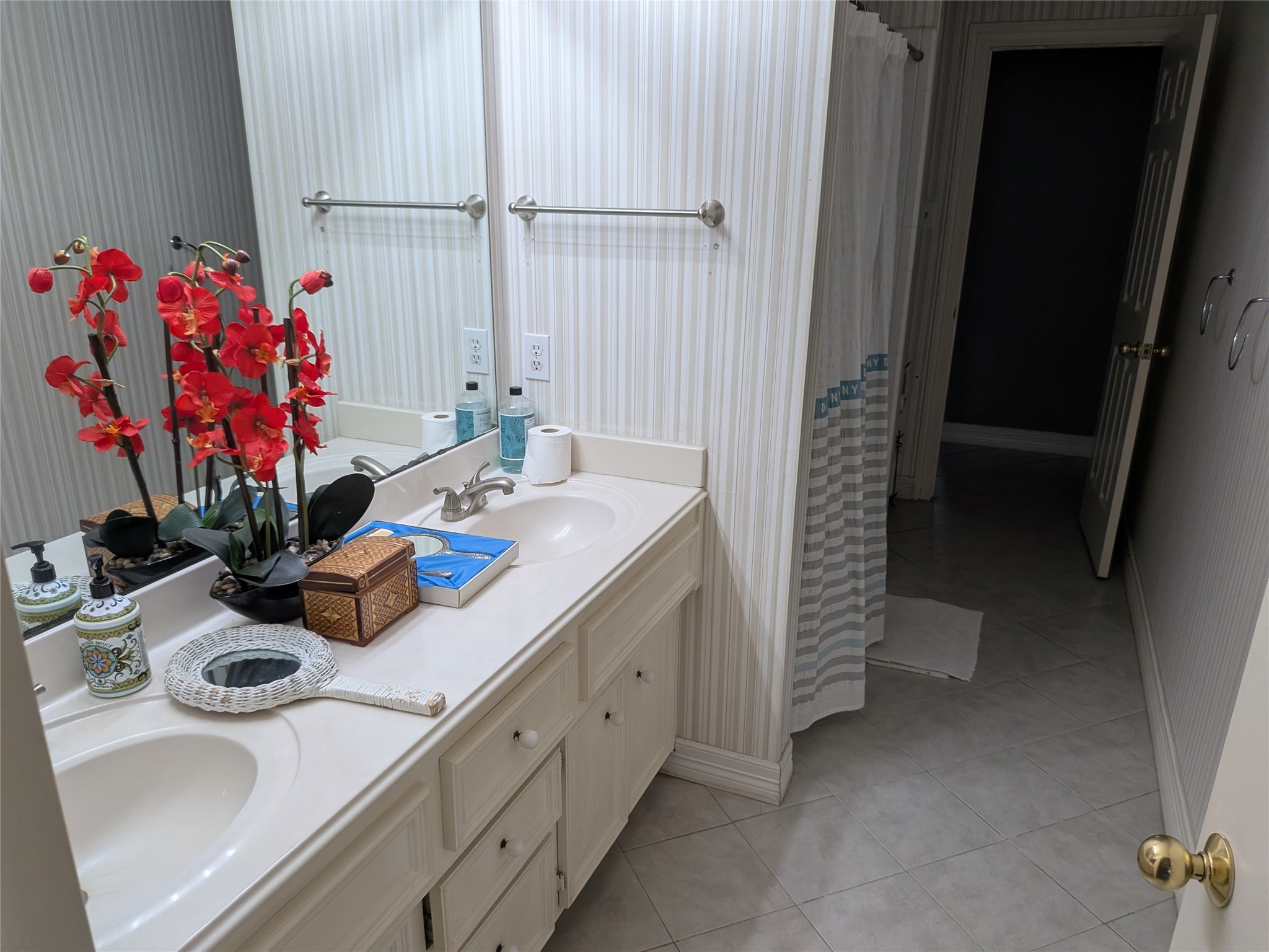 13107 Walnut Lake Road Houston, TX 77065 - Photo 16 of 23 a bathroom with a sink and a mirror