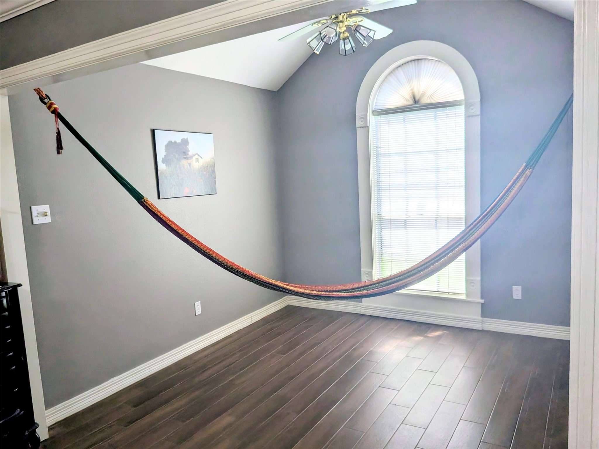 13107 Walnut Lake Road Houston, TX 77065 - Photo 20 of 23 a view of a livingroom with wooden floor and stairs