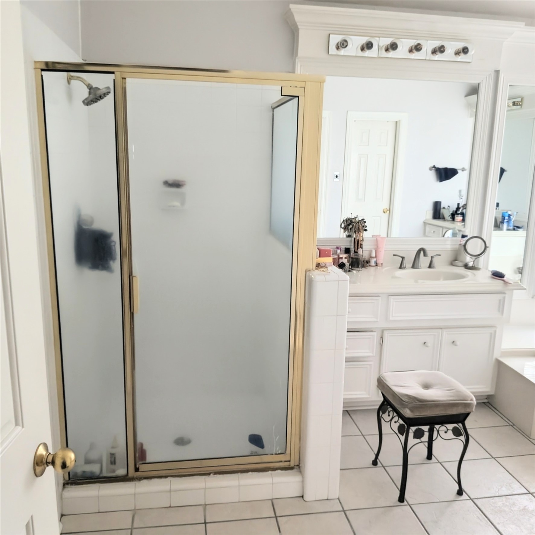 13107 Walnut Lake Road Houston, TX 77065 - Photo 22 of 23 a bathroom with a sink and a mirror