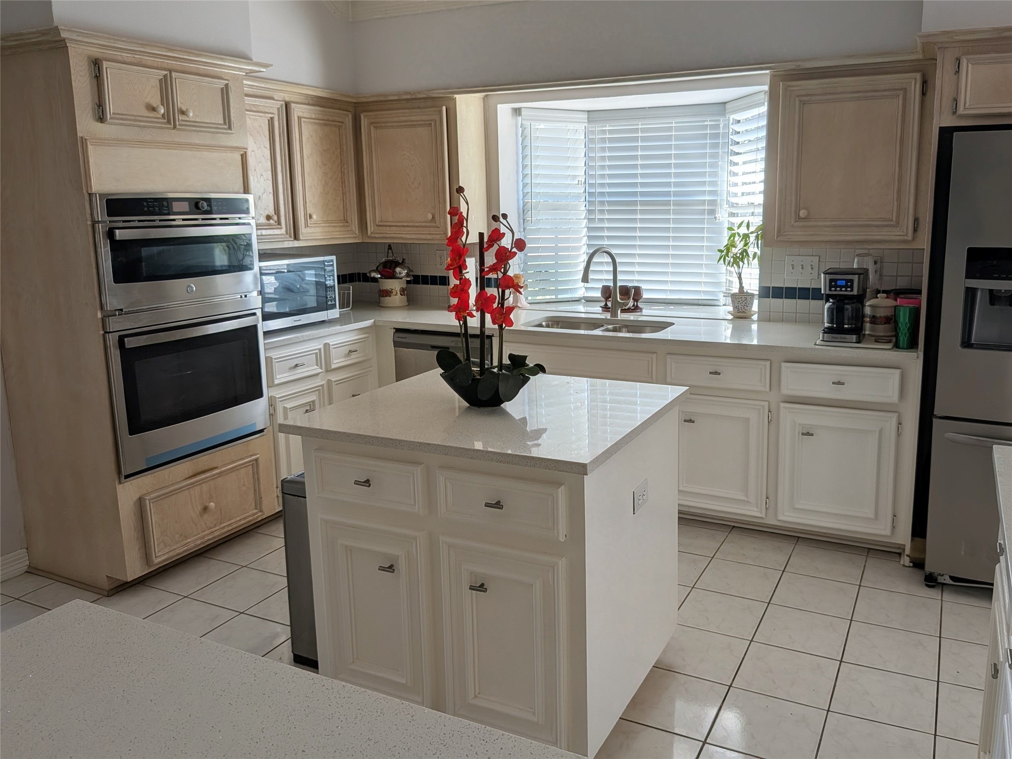 13107 Walnut Lake Road Houston, TX 77065 - Photo 8 of 23 a kitchen with white cabinets and appliances