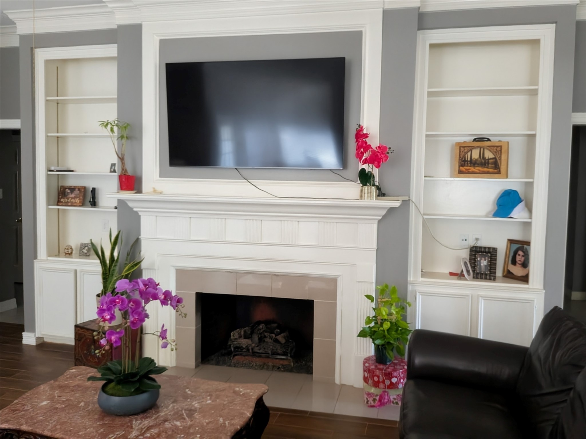 13107 Walnut Lake Road Houston, TX 77065 - Photo 9 of 23 a living room with furniture and a fireplace