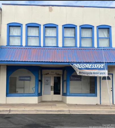 a view of building with large windows
