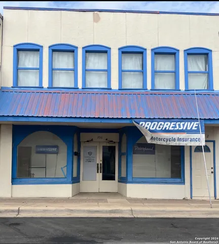 a view of building with large windows