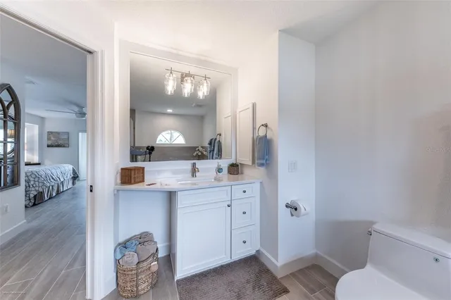 a kitchen with stainless steel appliances granite countertop a stove sink and cabinets