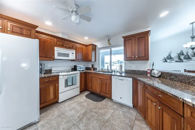 a view of a kitchen with furniture and cabinet