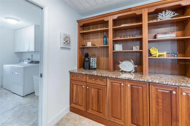 a view of a livingroom with furniture and a table
