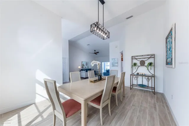 a view of a dining room with furniture