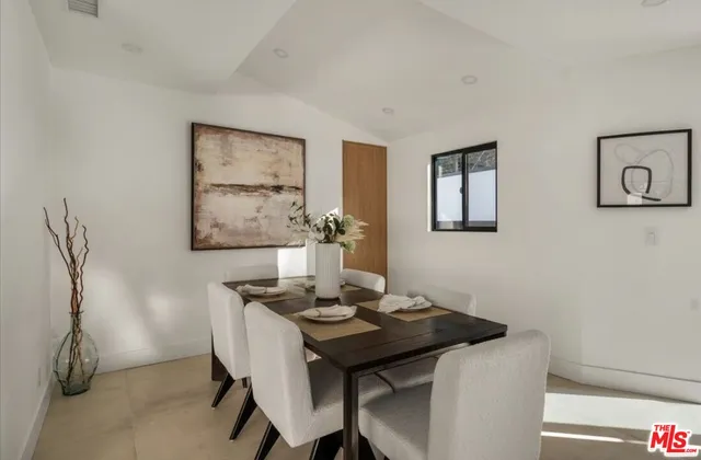 a view of a workspace with furniture