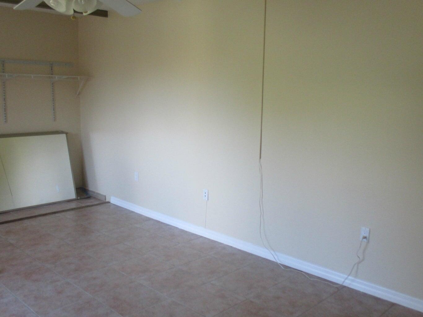 825 Center Street, Unit 3C Jupiter, FL 33458 - Photo 7 of 10 a view of an empty room