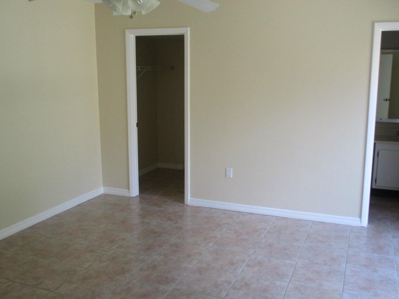 825 Center Street, Unit 3C Jupiter, FL 33458 - Photo 8 of 10 a view of an empty room