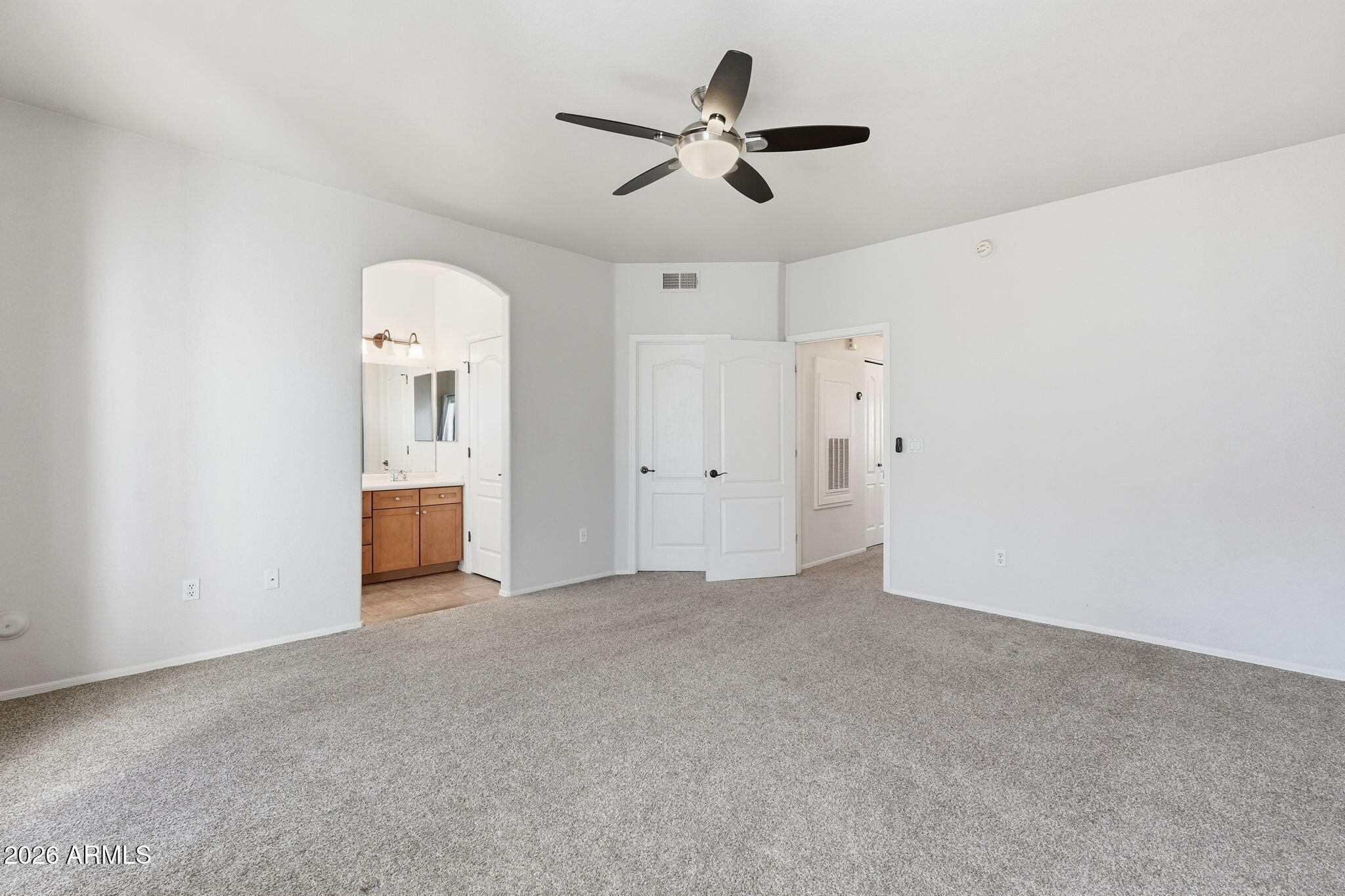 3150 East Beardsley Road, Unit 1064 Phoenix, AZ 85050 - Photo 15 of 30 a view of an empty room