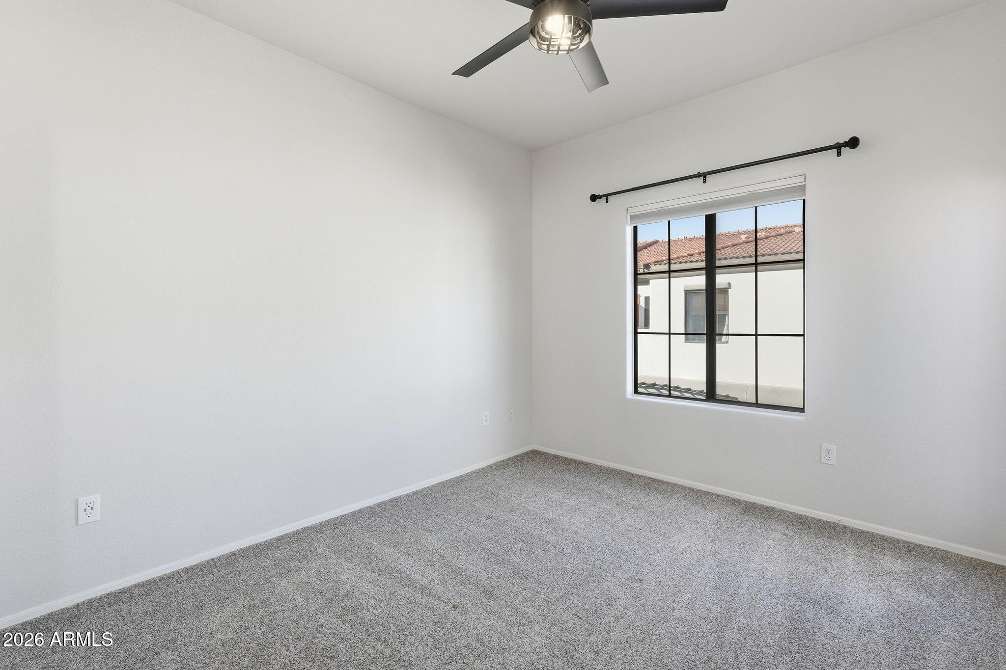 3150 East Beardsley Road, Unit 1064 Phoenix, AZ 85050 - Photo 19 of 30 an empty room with a window