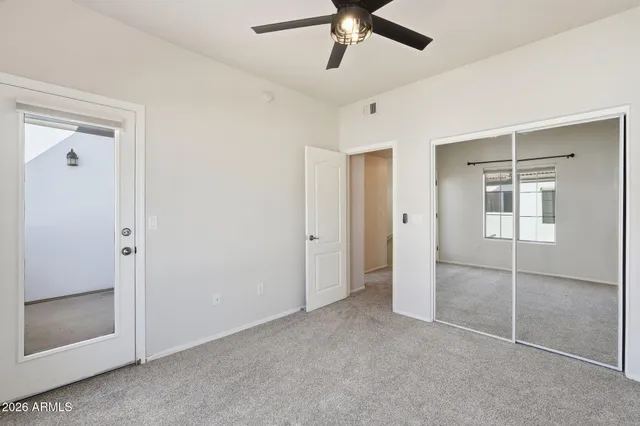 a bathroom with a double vanity sink mirror and double