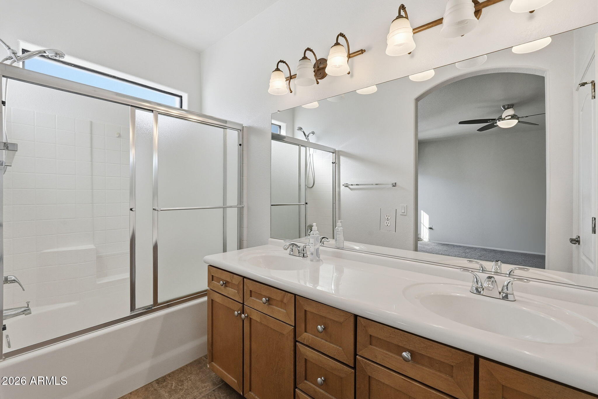 3150 East Beardsley Road, Unit 1064 Phoenix, AZ 85050 - Photo 23 of 30 a bathroom with a double vanity sink mirror and double