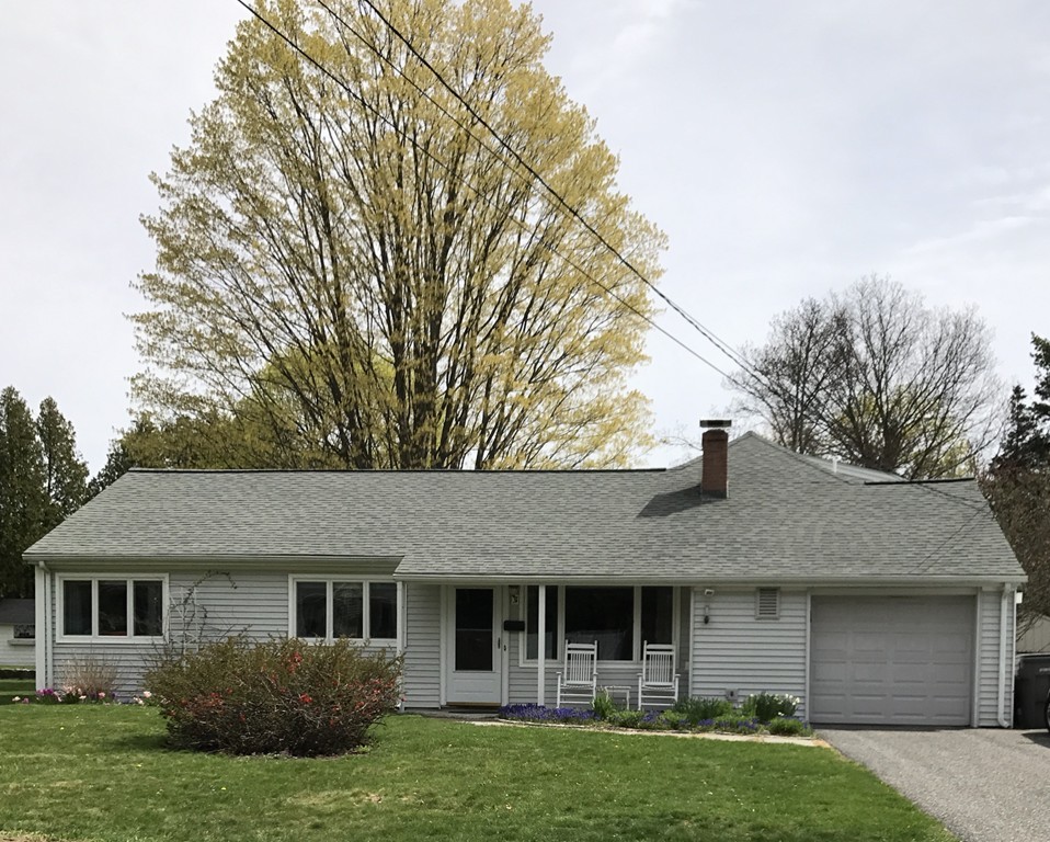 31 Elmfield Road Framingham, MA 01701 - Photo 1 of 25 a front view of a house with a garden